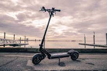 Load image into Gallery viewer, APOLLO GHOST Featuring two powerful 1000 W motors, ride the Ghost through the city or go for an adventure on the local trails as fast as 60 km/h (37 mph).
